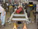 1969 Ford Bronco - Vehicle frame and powertrain assembly in a workshop setting.