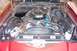 1970 Chevrolet Camaro - The engine bay of a car, showing the V8 engine and associated components.