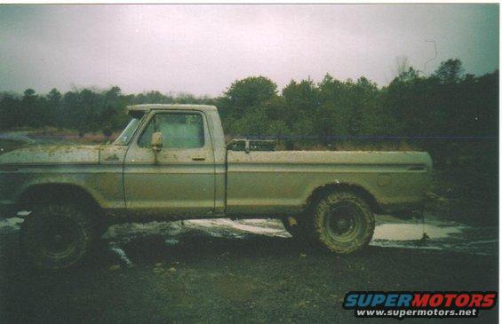 1979 Ford F-250 pickup truck parked in muddy terrain
