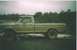 1979 Ford F-250 - Side view of a 1979 Ford F-250 pickup truck in a muddy, outdoor setting.