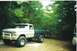 1979 Ford F-250 - This lifted 1979 Ford F-250 pickup truck features a two-tone paint scheme and off-road tires.