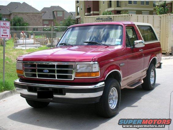 Red 1995 Ford Bronco 3/4 front view