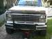 1986 Ford Bronco - Front view of a 1986 Ford Bronco, showing its grille and headlights.
