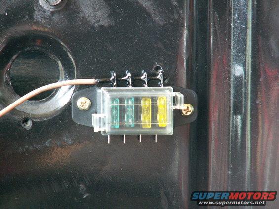 setup accessory power feed to relays via a 4-way fuse holder fed straight from battery(+)...carefully drilled out out thru connector tabs and fed wire thru hole....wire was soldered in place then coated with cpl of coats of liquid electrical tape to prevent corrosion.