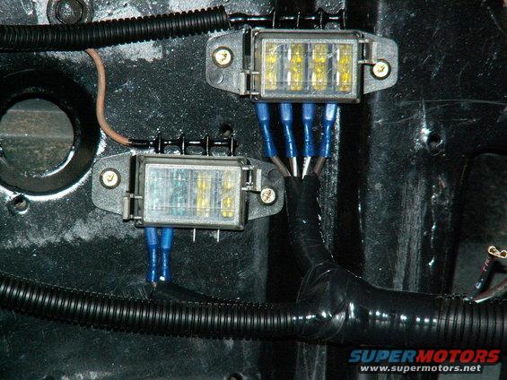 here are the two 4-way fuse holders needed for my 6 circuits/relays I am running extra....note the nice tidy wiring now hidden in the tubing throughout truck.