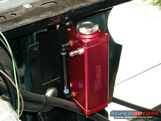 closer look at flash overflow tank....need to drill and tap bottom fitting for an inlet from radiator so will suck back coolant and use top as true overflow outlet