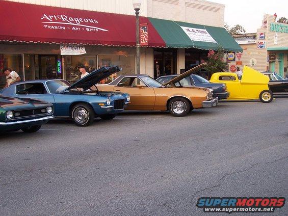 000_0486.jpg My 73 on one of the lines.  Many thanks to the shop keeper who insisted on parking her POS daily driver Olds on the line before we paraded in!