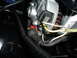 1984 Ford Bronco - Close-up of alternator wiring, showing a label with "ULTIMA" and part numbers.