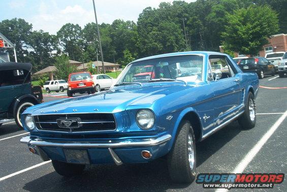 Blue 1965 Ford Mustang coupe, 3q front view