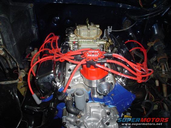 Engine bay with MSD distributor and red spark plug wires