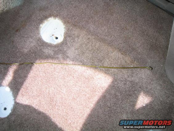 coathanger.jpg take the centrer console out