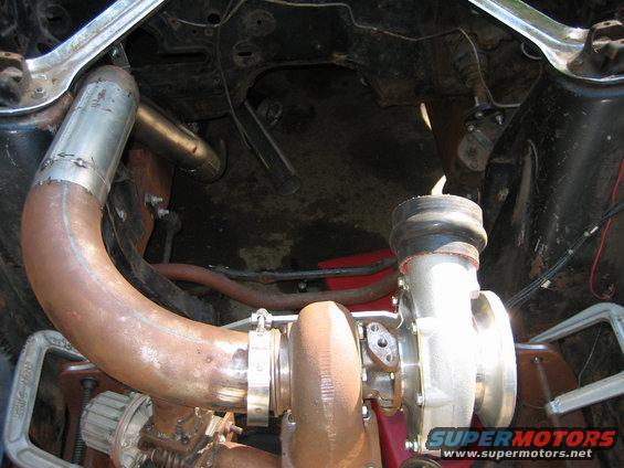 Turbocharger and exhaust piping under a vehicle