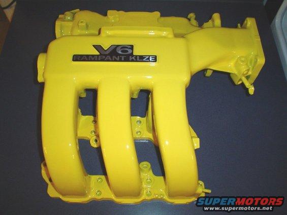Yellow V6 intake manifold with 'RAMPANT KLZE' text