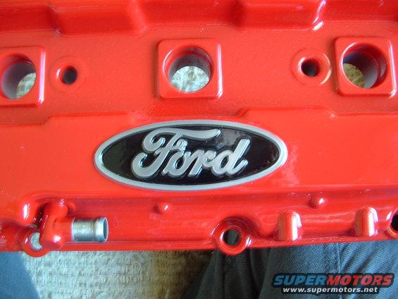 Red Ford valve cover with oval Ford logo
