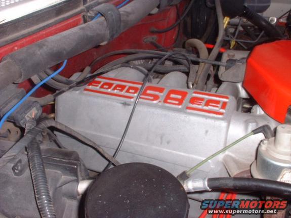 Ford 5.8L engine valve cover with red lettering