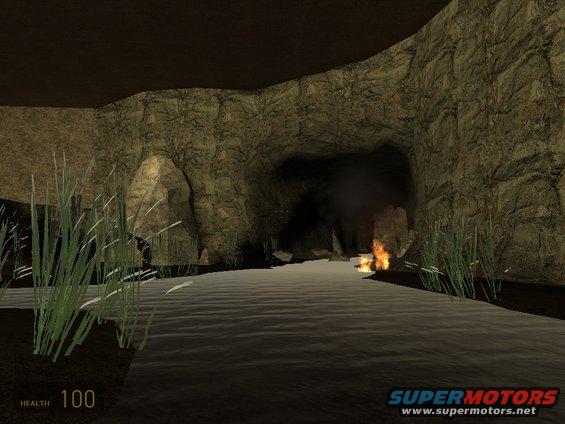 Cave scene with water, fire, and grass. Text 'HEALTH 100' and 'SUPERMOTORS' visible