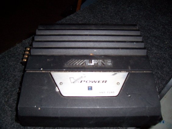 Alpine V-Power amplifier with model number V12-740 visible