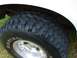 1993 Ford Bronco - Close-up of a vehicle's tire and wheel, showing the tread pattern and rim details.