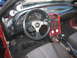 1993 Ford Probe - The interior of a 1993 Ford Probe features a custom steering wheel and aftermarket gauges.