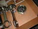 1967 Ford Fairlane - Engine pistons and connecting rods are laid out in a cardboard box, ready for installation.
