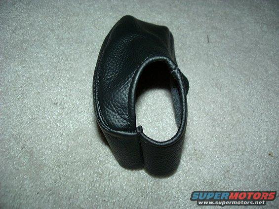 black leather shift boot on carpet