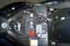 1994 Ford F-150 - Close-up of a motorcycle's battery compartment showing electrical components and wiring.