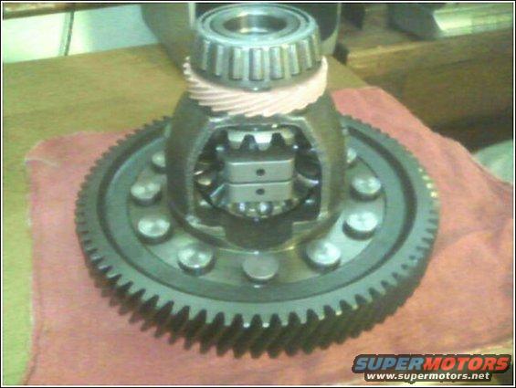 Differential gear assembly with bearing and ring gear