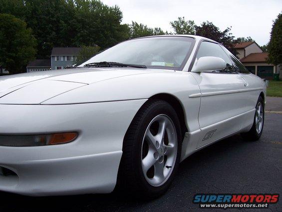 White 1993 Ford Probe GT parked on asphalt driveway, front quarter view