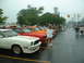1978 Ford Mustang II - A line of classic Ford Mustangs are parked in a lot on a cloudy day.