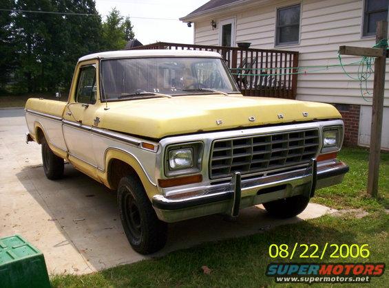 1978 Ford F-150 pickup truck, yellow and white, parked in a driveway