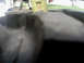 1996 Ford Bronco - The image shows a close-up of a tire's tread pattern with a website logo in the lower right corner.