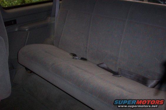 Back seat with seatbelts in a vehicle
