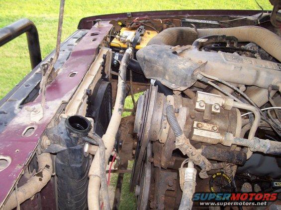 1989 Ford Bronco II engine bay, radiator removed, showing engine components and fan
