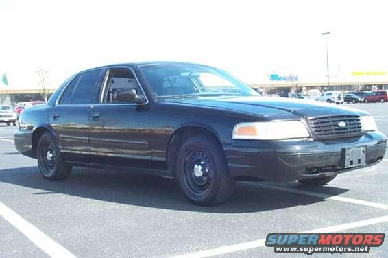 Black 1995 Ford Crown Victoria, 3/4 front view