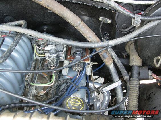 cody23dipt.jpg The coil support brace couldn't be reinstalled, but since the dipstick was also loose, its brace was bent up to meet the bracket solving both problems.