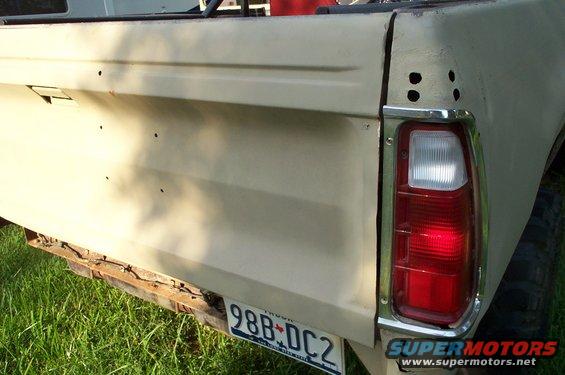 1978 Dodge Power Ram tailgate with license plate 98B-DC2 and red taillight