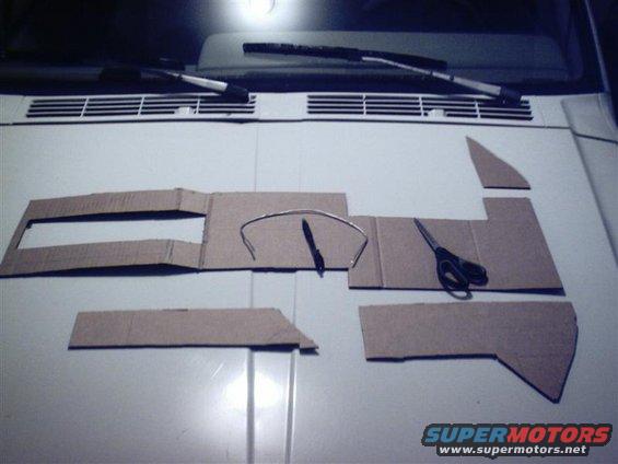 sunp0127-(medium).jpg Basics. Here you see some of the cardboard templates, scissors, a pen, and some silver solder (also known as a redneck contour gauge)
