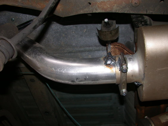 Exhaust pipe and muffler assembly with clamp and hanger