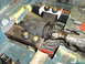 1997 Ford Ranger - Transmission and driveshaft components are being installed into a vehicle's chassis.