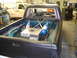 1997 Ford Ranger - This modified pickup truck features a custom fuel cell and nitrous oxide system in the bed, with a roll cage visible inside.