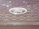 2002 Ford Crown Victoria - Close-up of a Ford emblem on a honeycomb grille, with a Supermotors.net watermark at the bottom.