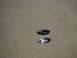 2002 Ford Crown Victoria - Two Ford oval emblems are shown against a textured background.