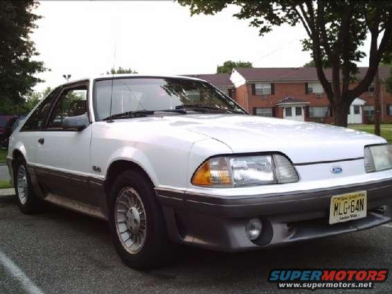 White 1989 Ford Mustang GT parked outside, front 3/4 view