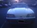 1989 Ford Mustang - Front view of a 1989 Ford Mustang GT parked in a lot at dusk.