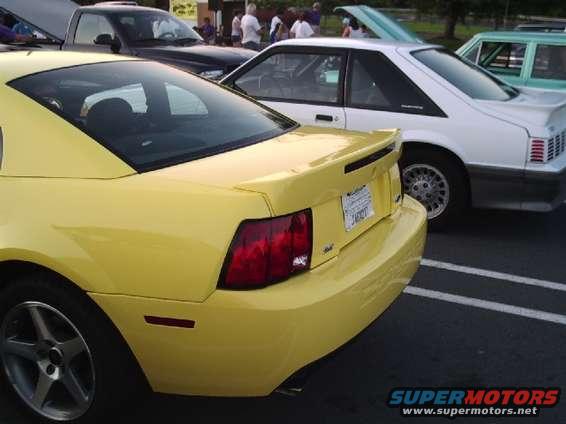 Yellow Ford Mustang rear view