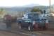 1994 Ford F-150 - A vintage blue Ford F-100 competes in a truck pull, demonstrating its towing power.