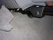 2000 Ford Crown Victoria - Carpet is pulled back to aid in removing the lower plastic panel.
