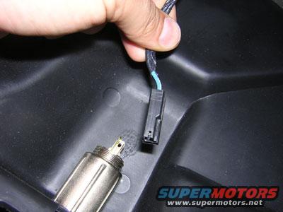 Unplug the connector to the auxillary 12v plug.
This is what I will use to splice the Sirius tuner into for its power harness.