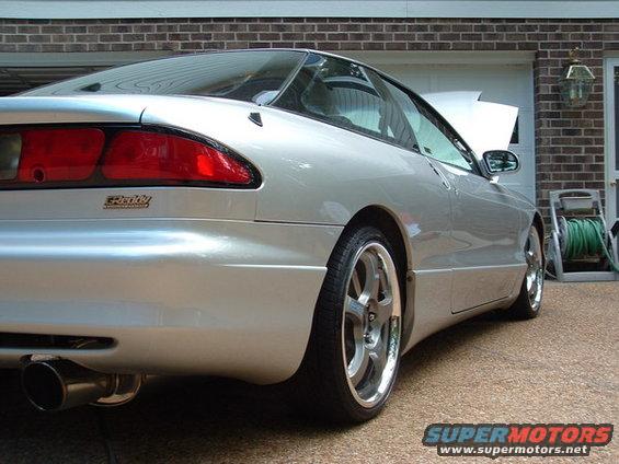 Silver 1993 Ford Probe rear quarter view with aftermarket wheels