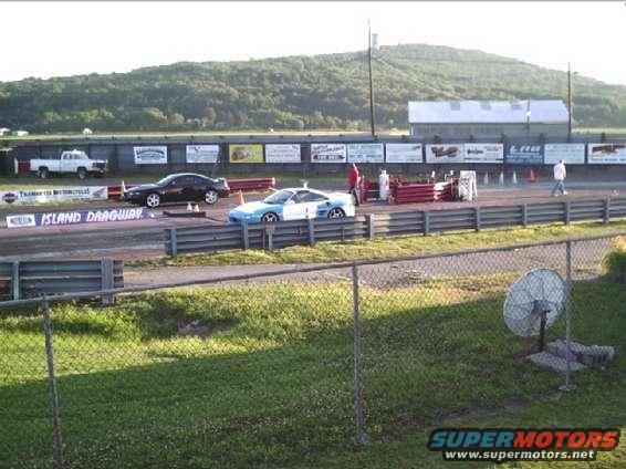 Blue and white sports car at Island Dragway